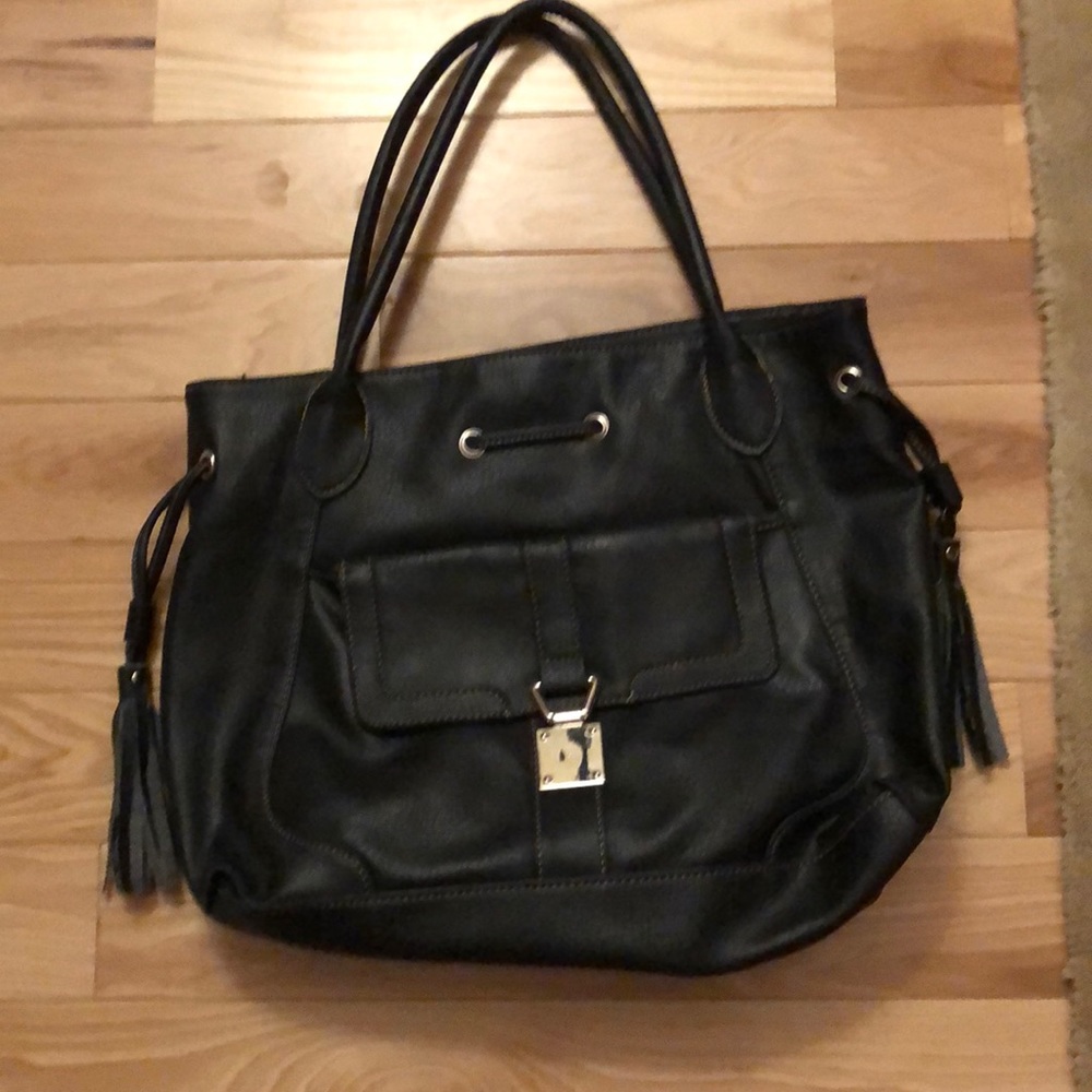 Black shoulder bag with tassels